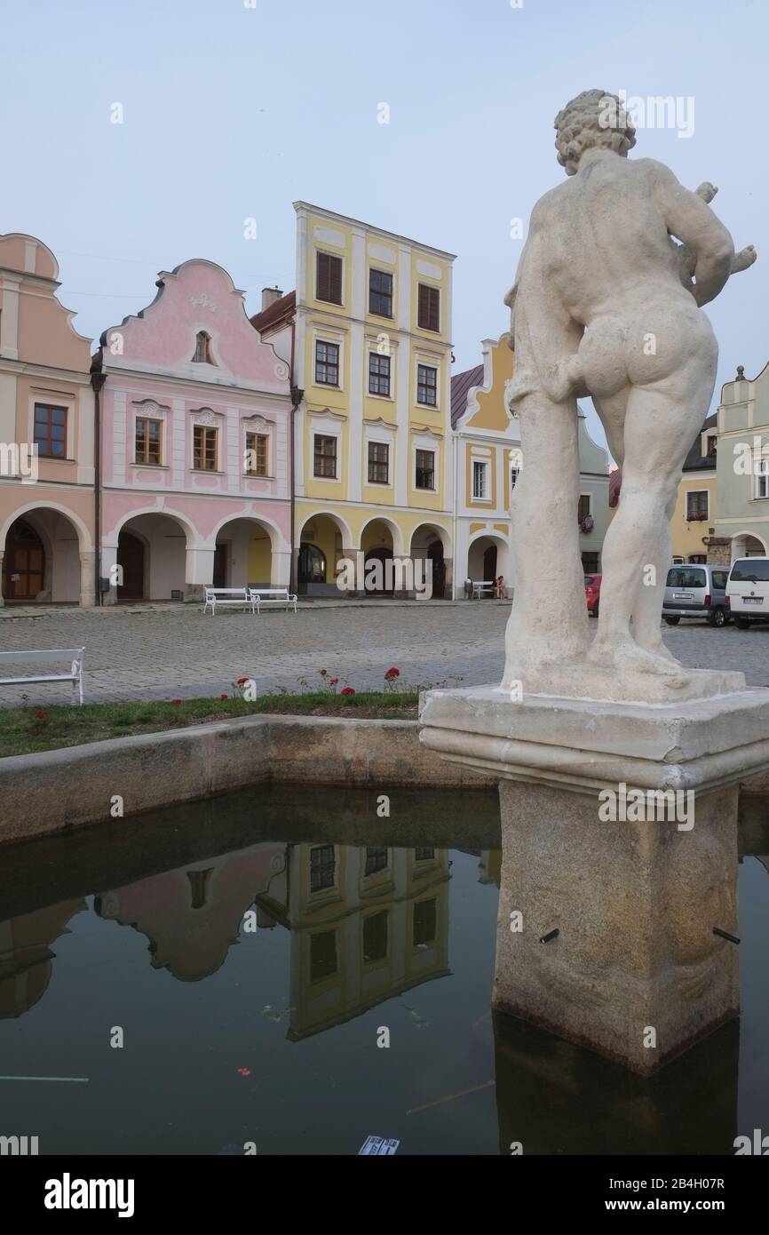 Baroque statue of Silenus holding baby Dionysos. Telc, Czech Republic Stock Photo
