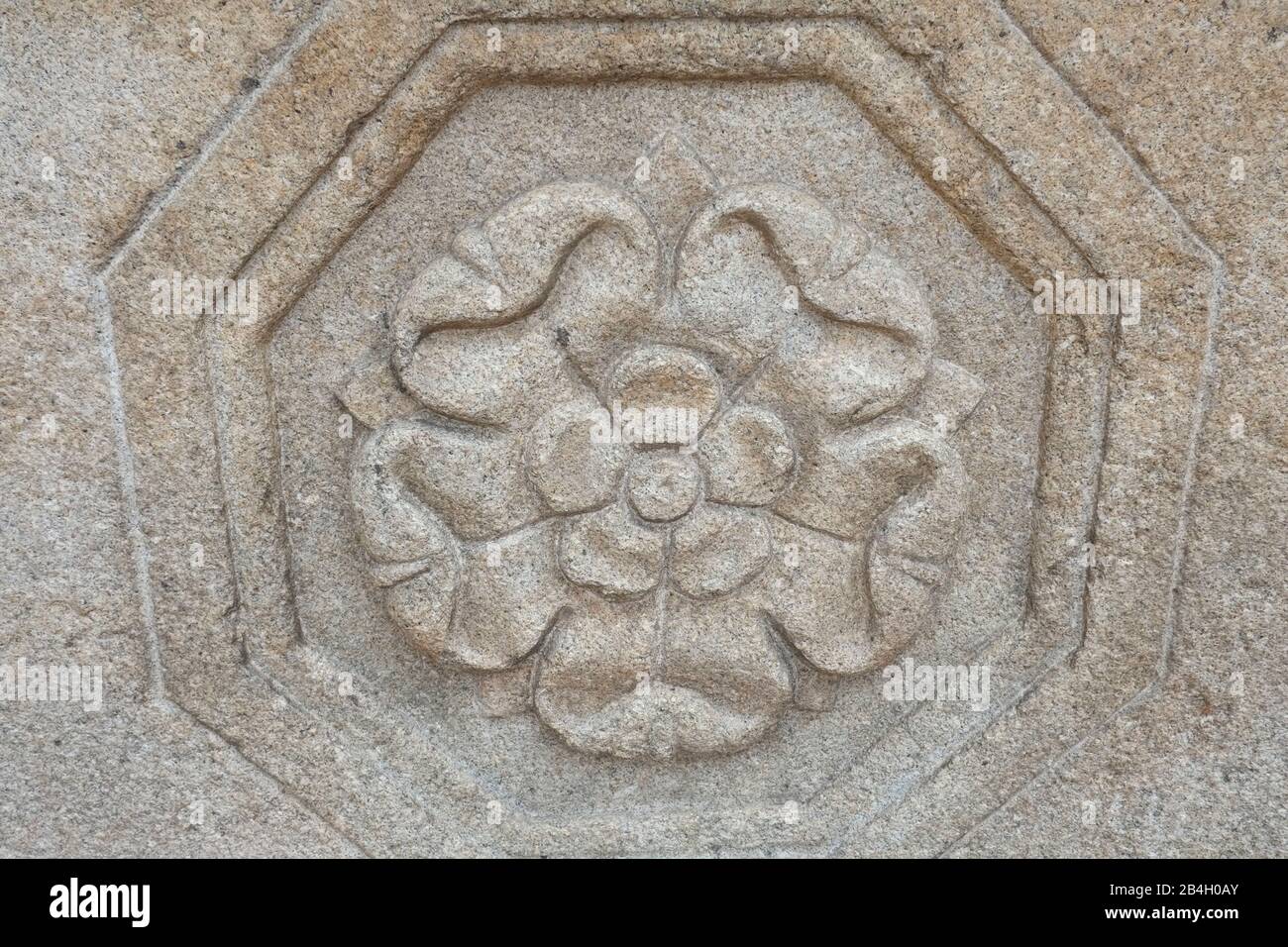 Image of rose carved into granite slab Stock Photo