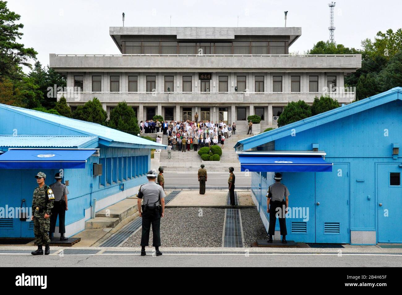 Korean soldiers observe the border between South and North Korea, security zone (DMZ), Panmunjom, South Korea. Stock Photo