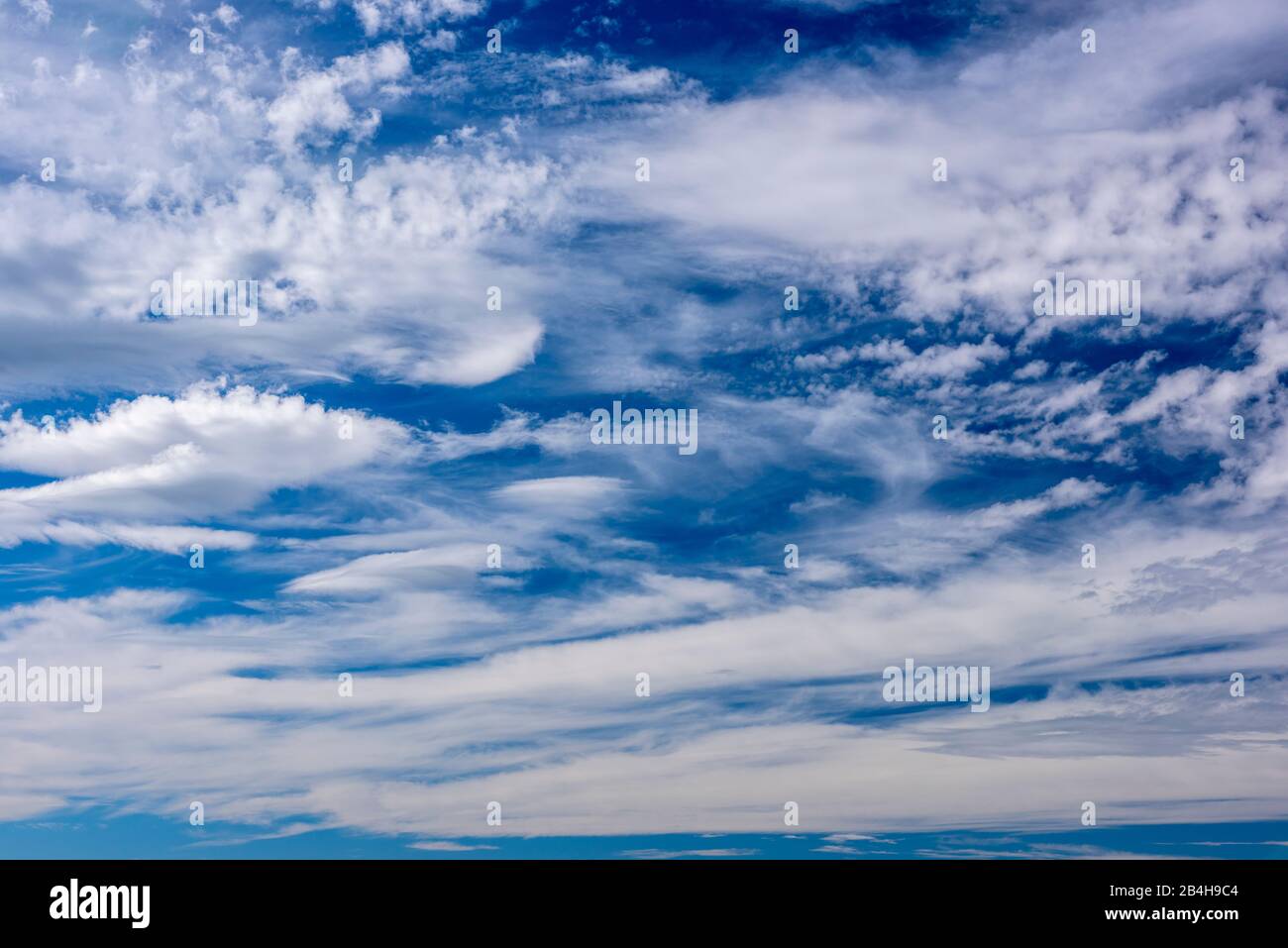 Nice weather Cumulus cloud in front of blue sky Stock Photo