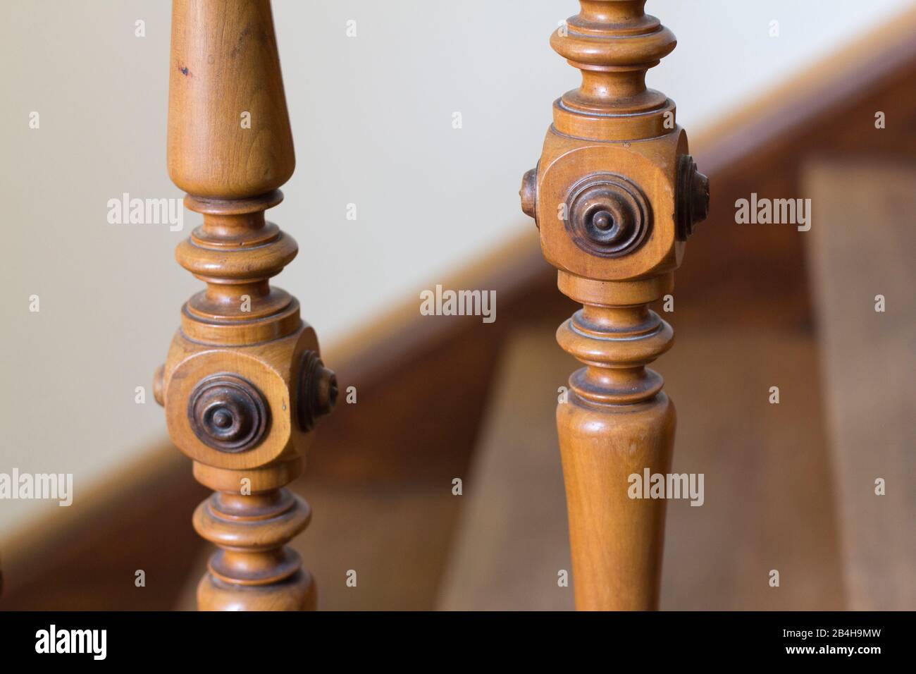 Decorated railing poles made of wood Stock Photo