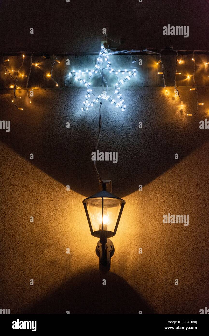 Germany, Christmas lights on a house facade Stock Photo Alamy