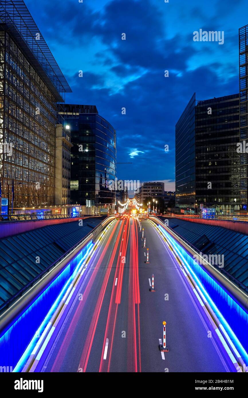 Europe, Belgium, Brussels, European Quarter, left Council of Europe, right European Commission, evening, street, stripes of light Stock Photo