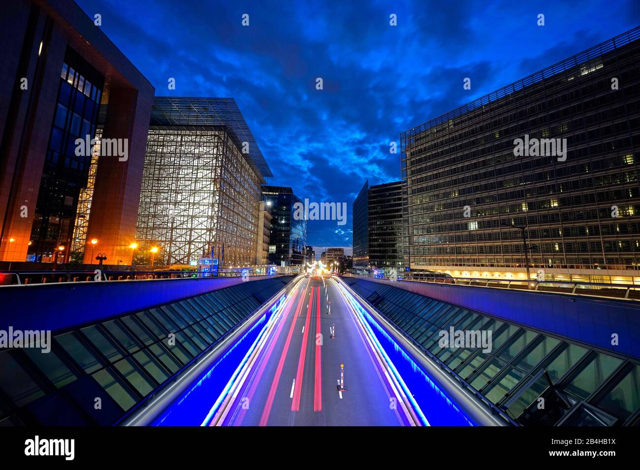 Europe, Belgium, Brussels, European Quarter, left Council of Europe, right European Commission, evening, street, stripes of light Stock Photo