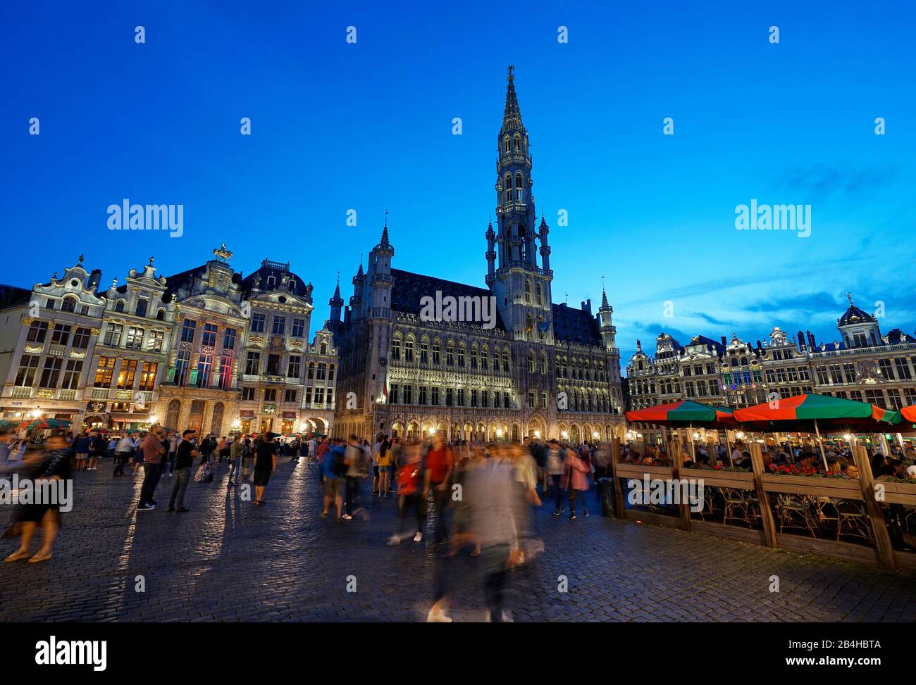 Europe, Belgium, Brussels, Old Town, Grand Place, Grote Markt, Historic Buildings, City Hall, Tourists, evening, illuminated Stock Photo