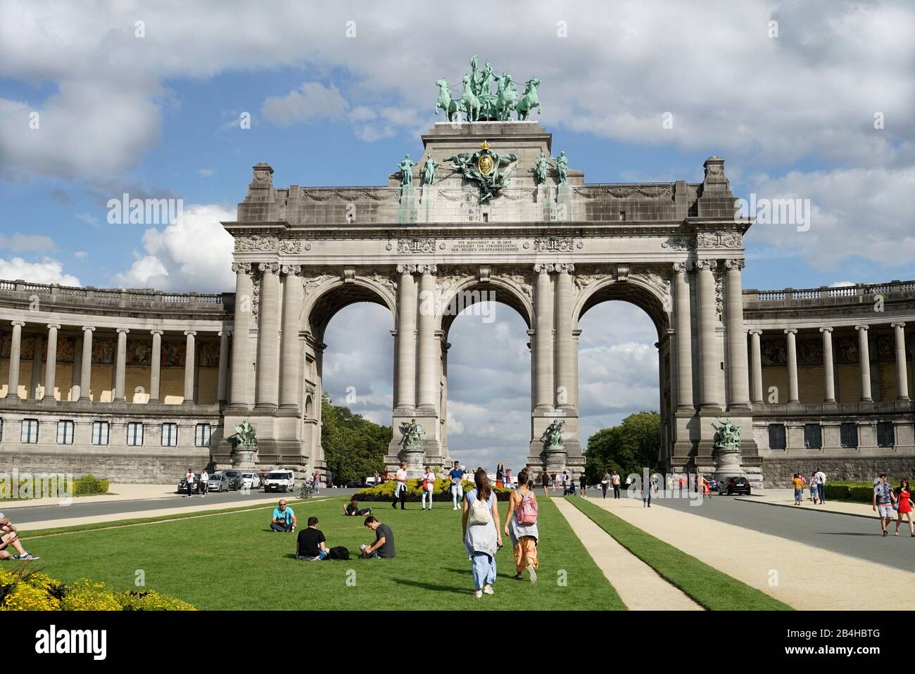 Europe, Belgium, Brussels, Parc du Cinquantenaire, jubilee park, triumphal arch, meadow, young people Stock Photo