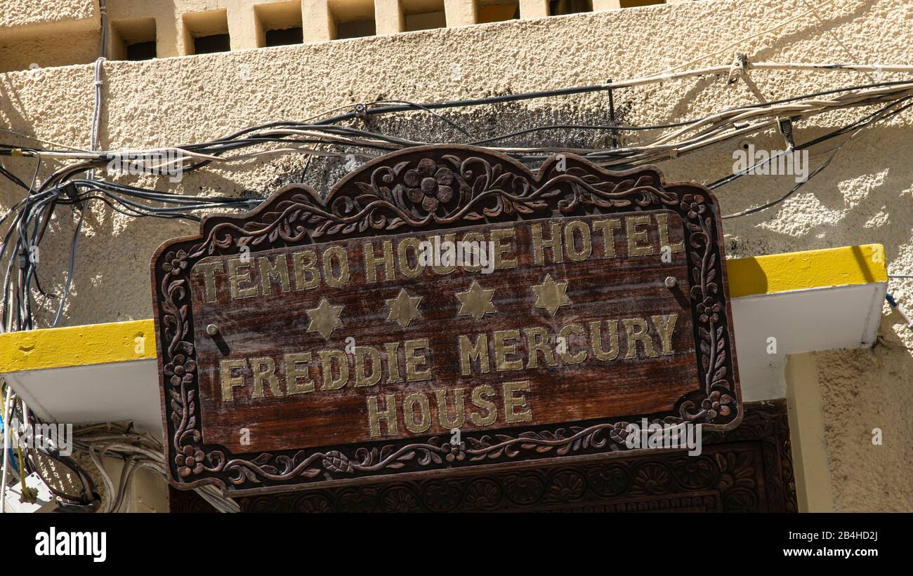 Destination Tanzania, Zanzibar Island: Impressions from Stone Town, the oldest district of Zanzibar City, the capital of the Tanzanian state of Zanzibar. Freddy Mercury House, sign above the entrance. Stock Photo