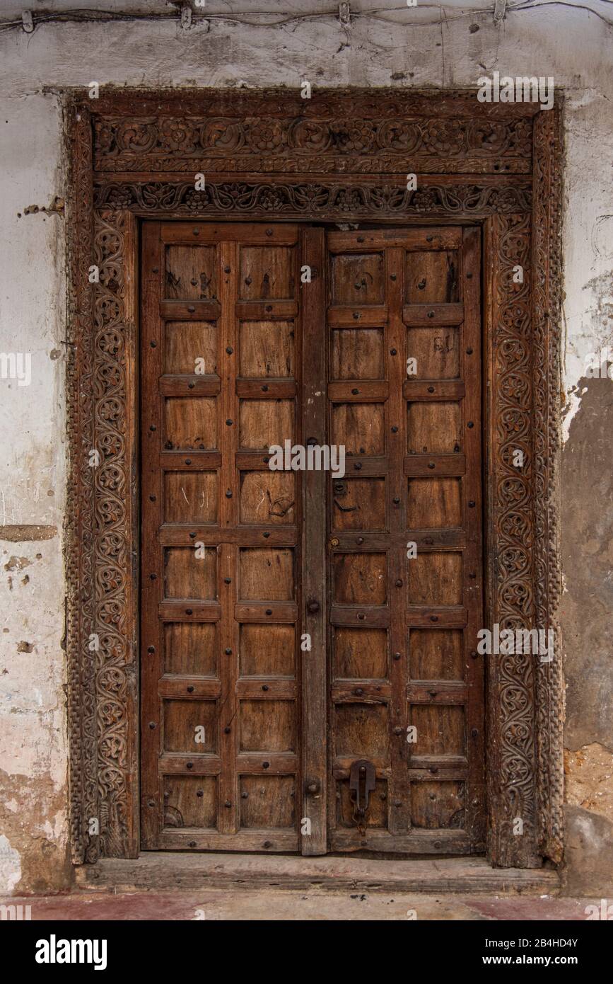 Decorated wooden door in a house in Stone Town, Stone Town, Zanzibar City