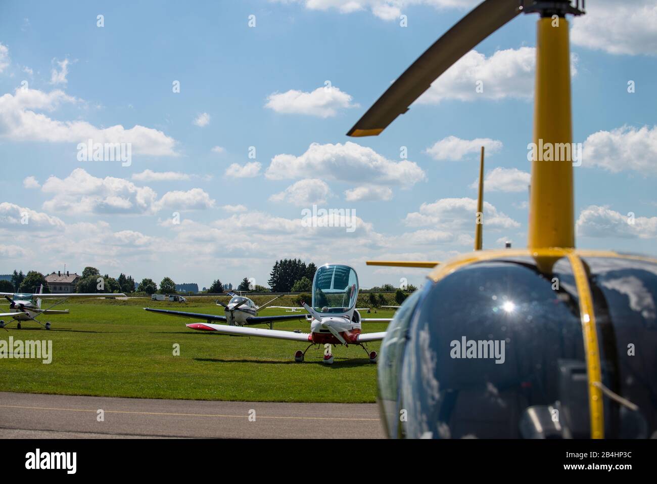 Sport aircraft, on a small airfield, helicopter Stock Photo