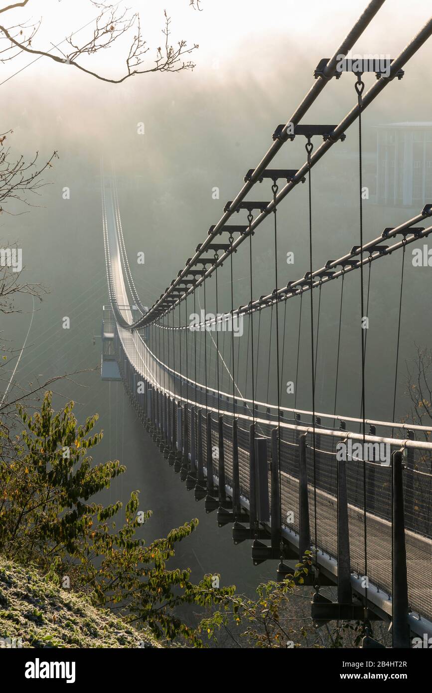 Germany, Saxony-Anhalt, Upper Harz, suspension bridge TitanRT, Rappbodetalsperre, with 483 meters one of the longest rope bridges in the world, Harz. Stock Photo