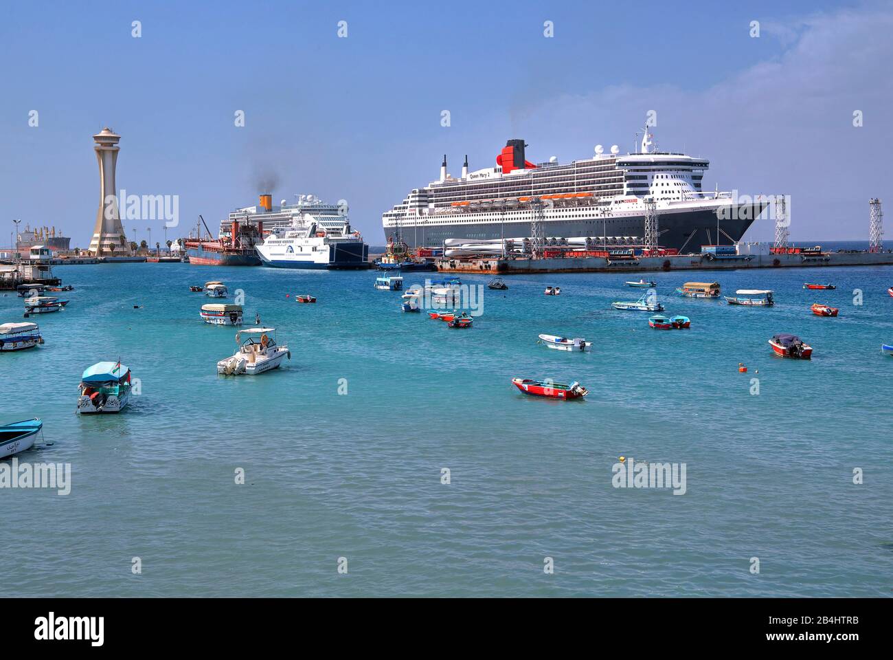 Pleasure boats and cruise ships Costa Victoria and Queen Mary 2 in the port Akaba Aqaba, Gulf of Aqaba, Red Sea, Jordan Stock Photo