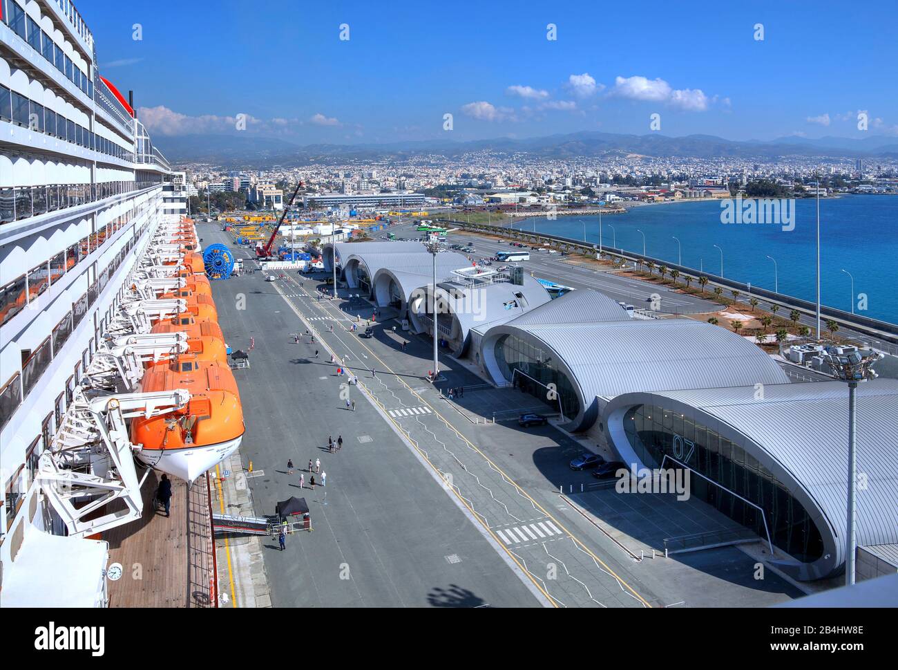 Boat deck of cruise ship Queen Mary 2 with view on cruise terminal Sea and city Limassol, Bay of Akrotiri, Mediterranean Sea, Cyprus Stock Photo