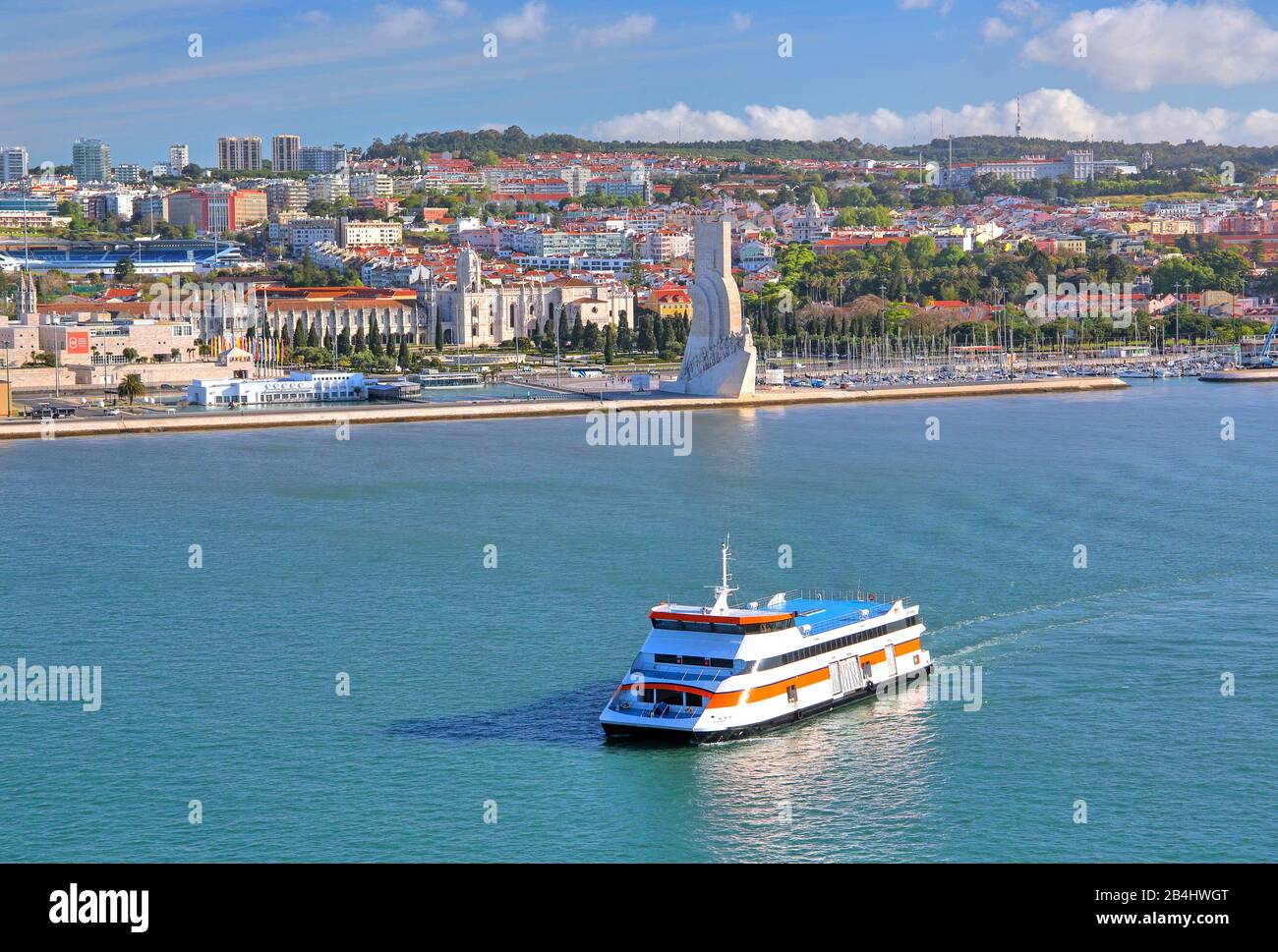 Jeronimos Monastery and Maritime Monument on the shore of the Tagus with ferry, Lisbon, Portugal Stock Photo