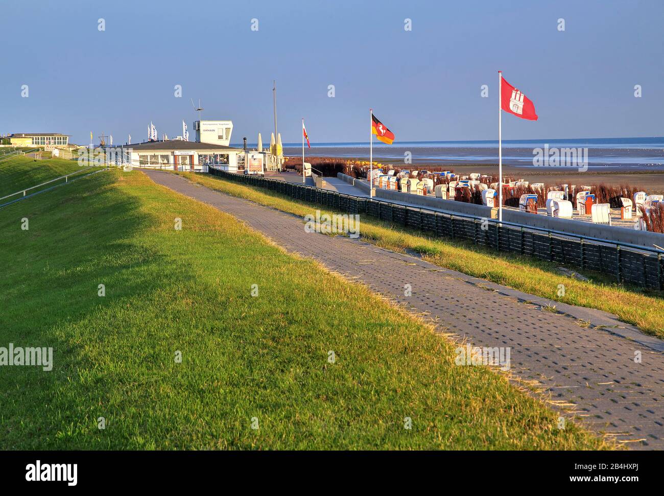 Dike promenade with beach and beach chairs in the district Döse, North Sea resort Cuxhaven, Elbe estuary, North Sea, North Sea coast, Lower Saxony, Germany Stock Photo