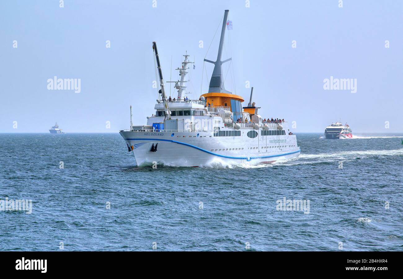 Sea-bathing ship Helgoland and catamaran on the way to the island Helgoland, Helgoland bay, German bay, North Sea island, North Sea, Schleswig-Holstein, Germany Stock Photo