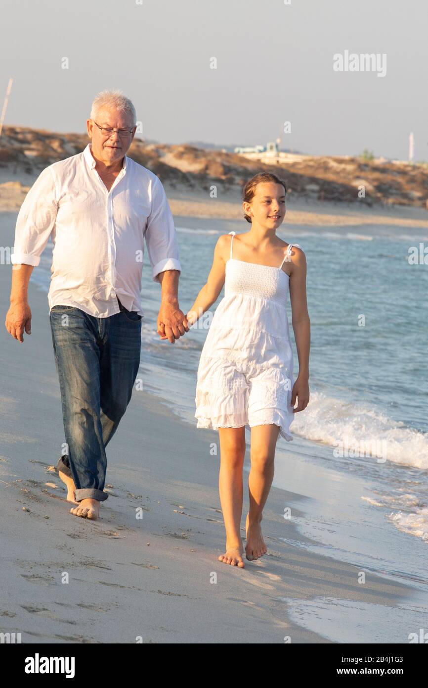 Grandpa, granddaughter, stand, walk Stock Photo