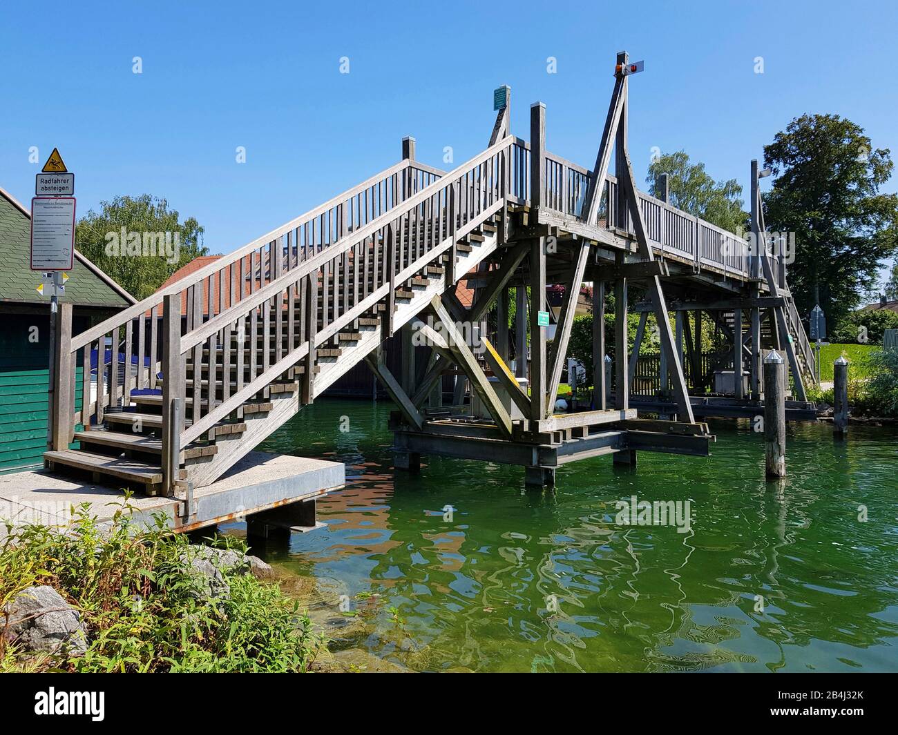Starnberger See, wooden bridge on the northern lake shore, it is opened when a larger boats passes through. The lake is the fifth largest lake in Germany. Popular destination Stock Photo