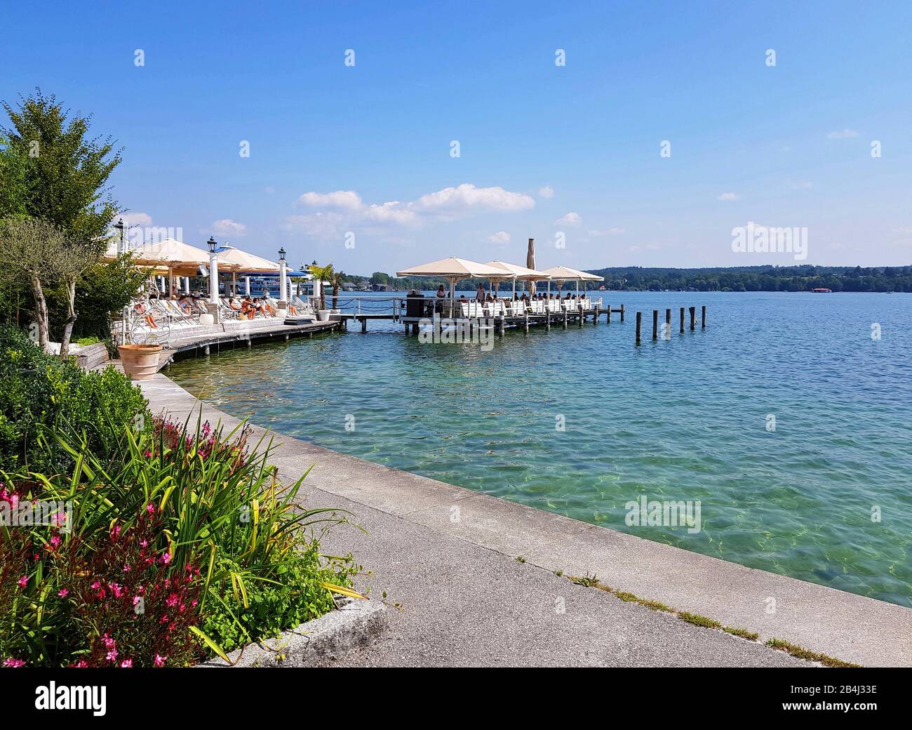 Lake Starnberg, cafe in the lake. He is the fifth largest lake in Germany. In 1886 drowned in the scandal-tale fairy tale king Ludwig II. Popular destination. Stock Photo