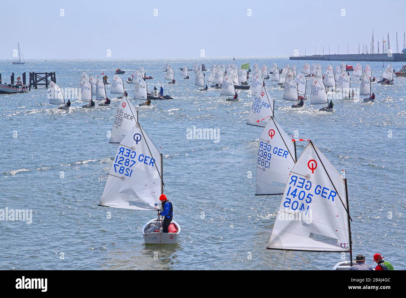 Optimist sailors preparing for Störtebeker Cup on South Beach, Heligoland, Heligoland Bay, German Bight, North Sea Island, North Sea, Schleswig-Holstein, Germany Stock Photo