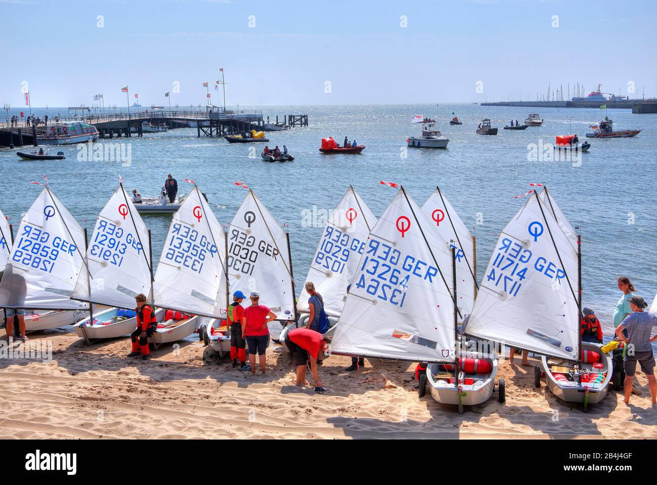 Optimist sailors preparing for Störtebeker Cup on South Beach, Heligoland, Heligoland Bay, German Bight, North Sea Island, North Sea, Schleswig-Holstein, Germany Stock Photo