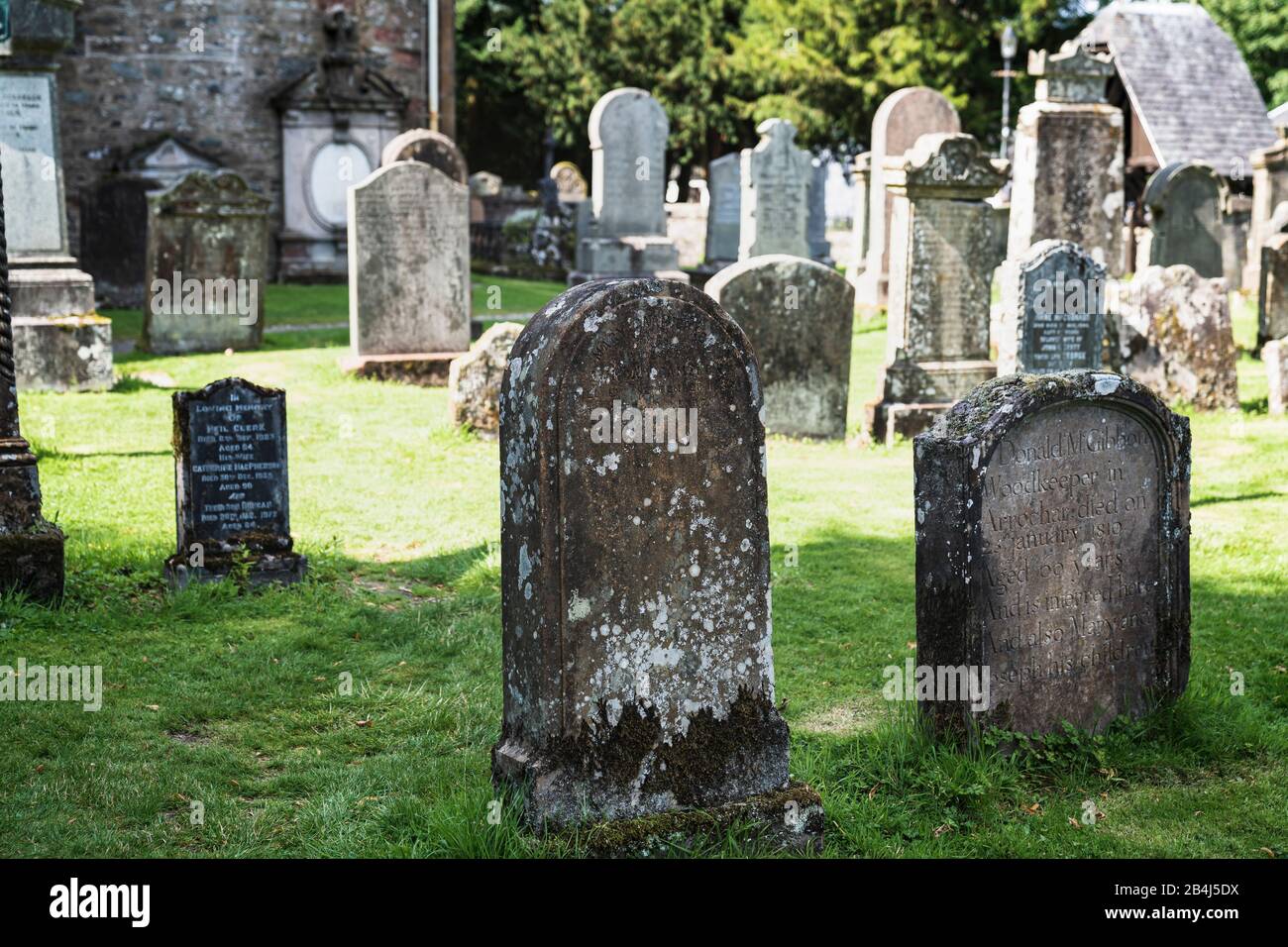 Very old graves, Luss Parish Church, Church, Luss, Loch Lomond, Scotland, United Kingdom, Europe Stock Photo
