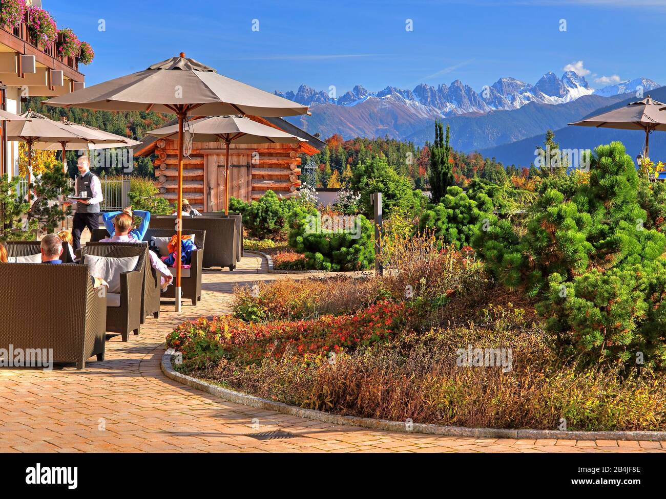 Garden terrace of the Interalpenhotel against the Kalkkögel (2804m), Telfs, Inn Valley, Tyrol, Austria Stock Photo