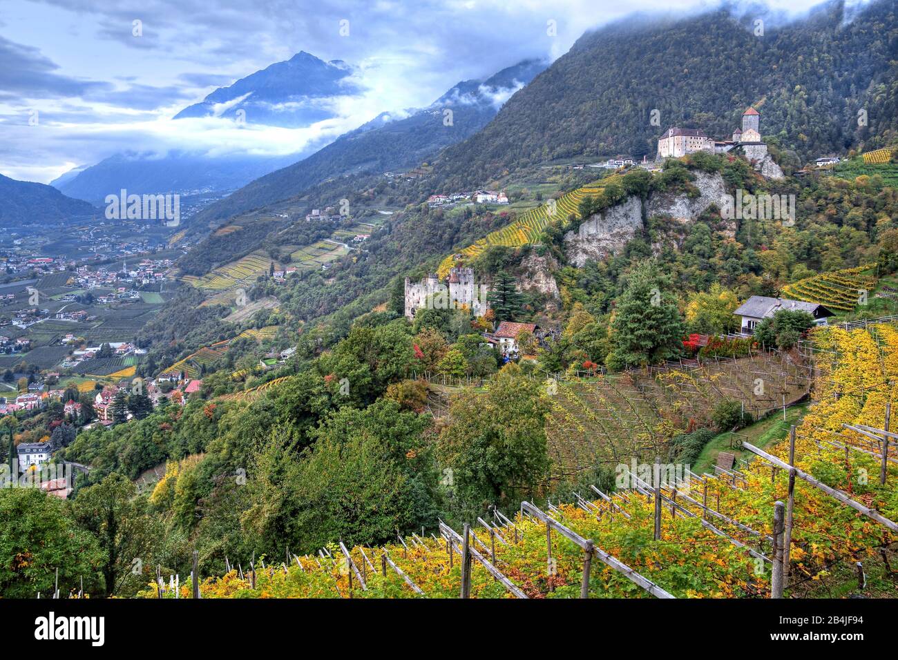 View of the Adige Valley with Brunnenburg Castle and Tyrol Castle, Tyrol, Burgraviato, South Tyrol, Italy Stock Photo