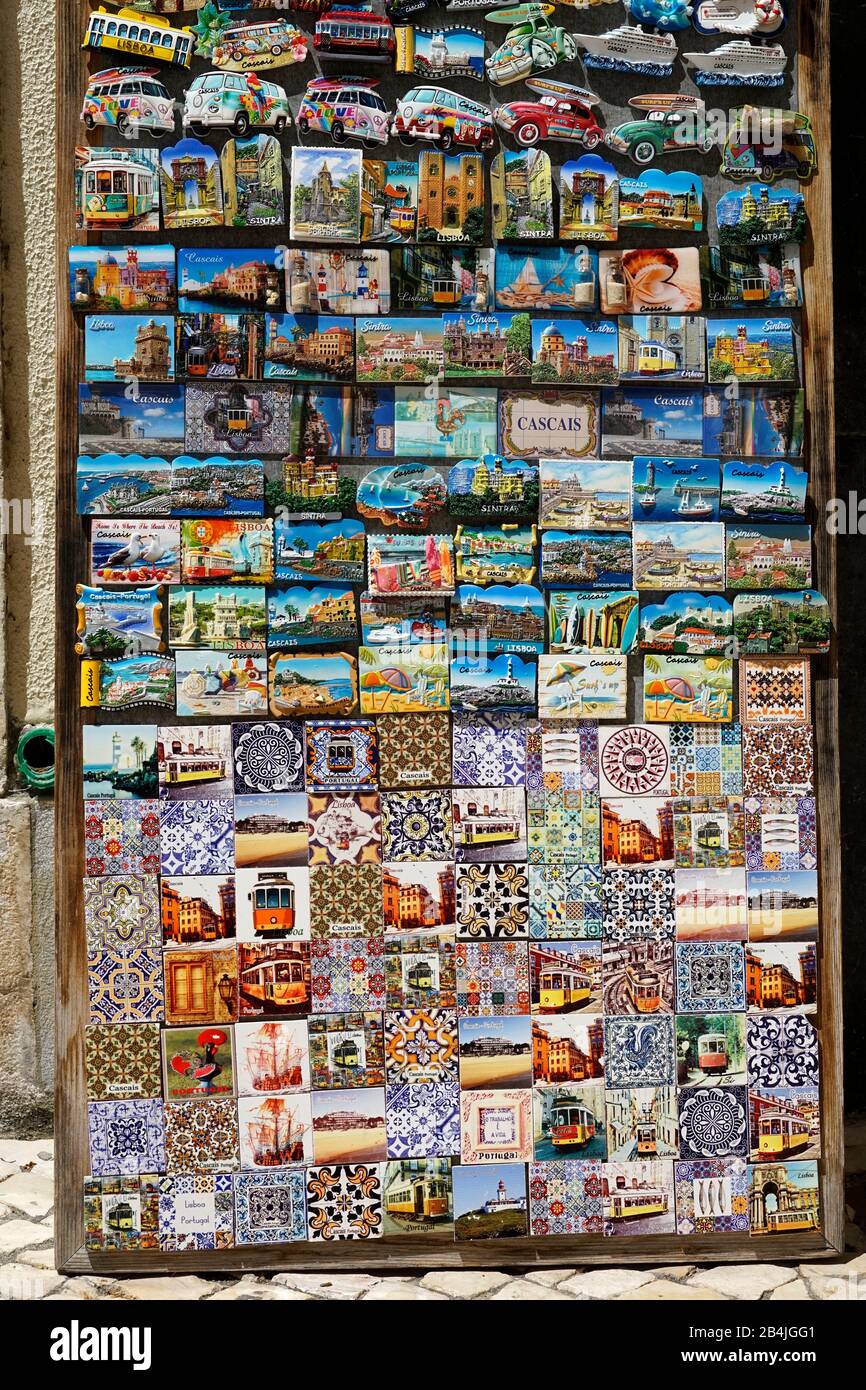 Europe, Portugal, Lisbon region, Cascais, shop, outdoor display with postcards and azulejos, decorated tiles, souvenir, travel souvenirs Stock Photo