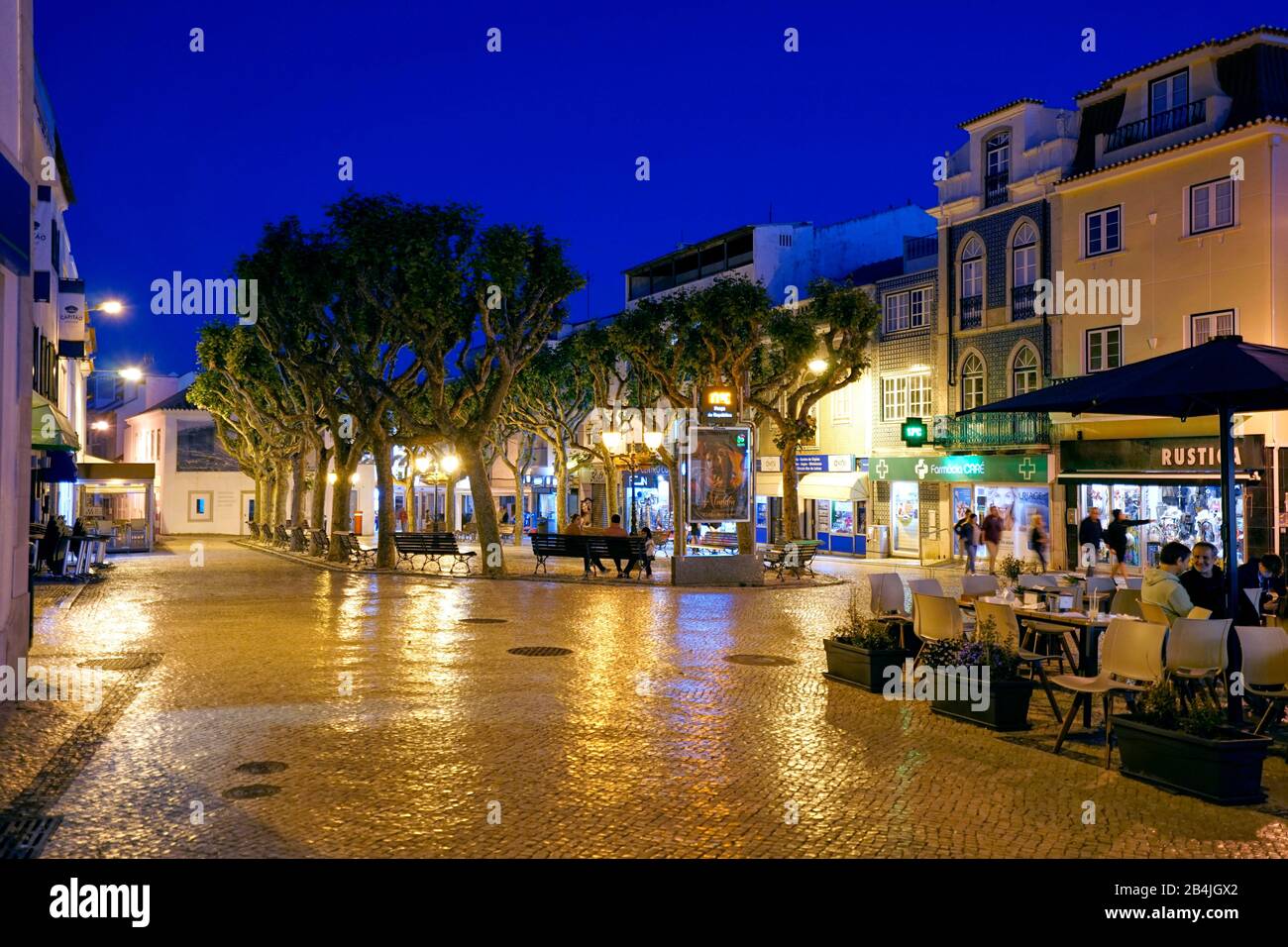 Europe, Portugal, Centro region, Ericeira, center, pedestrian area, paved, evenings, lights, street restaurant Stock Photo