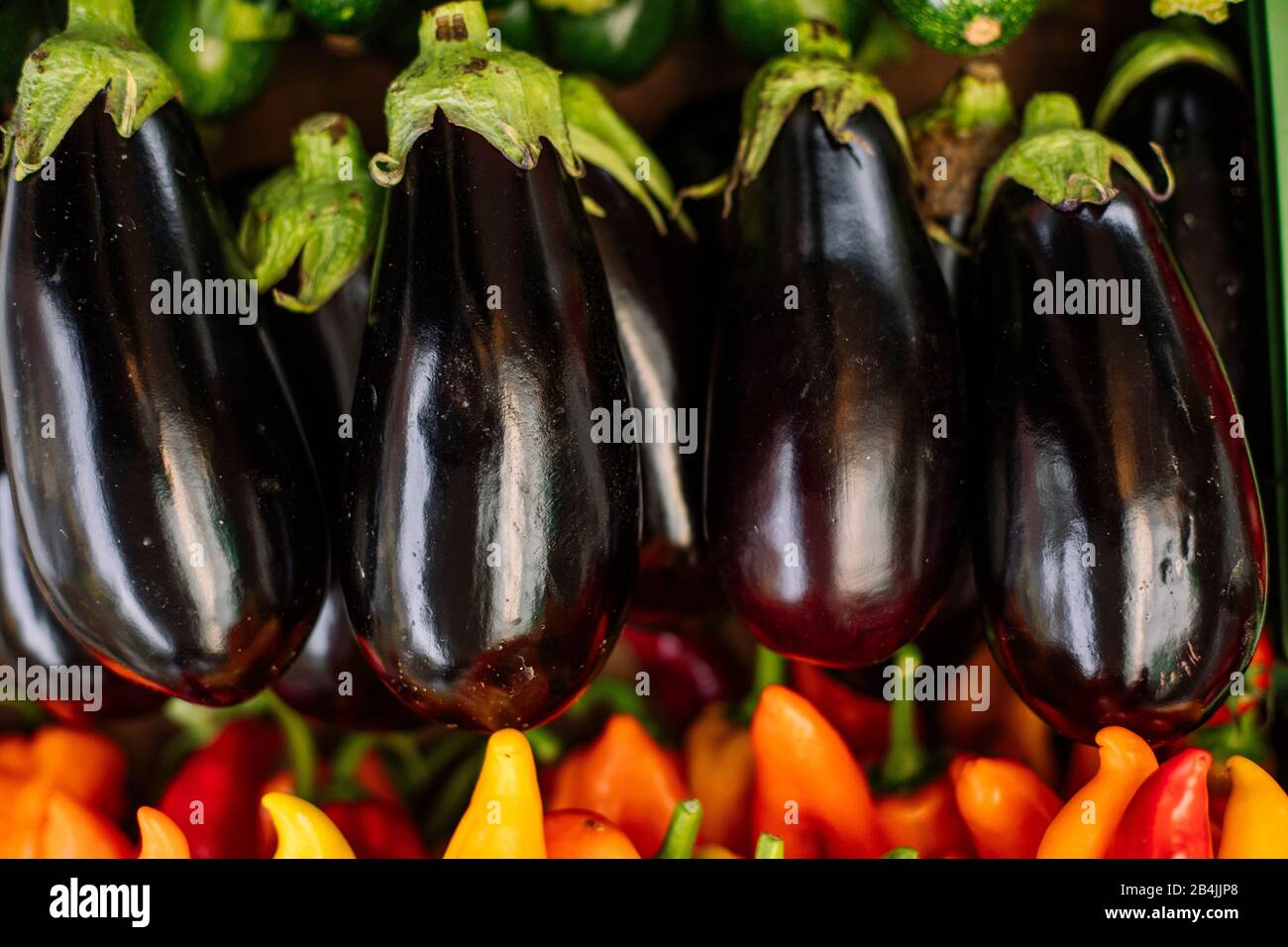 aubergine for sale at the market stall, close-up Stock Photo - Alamy