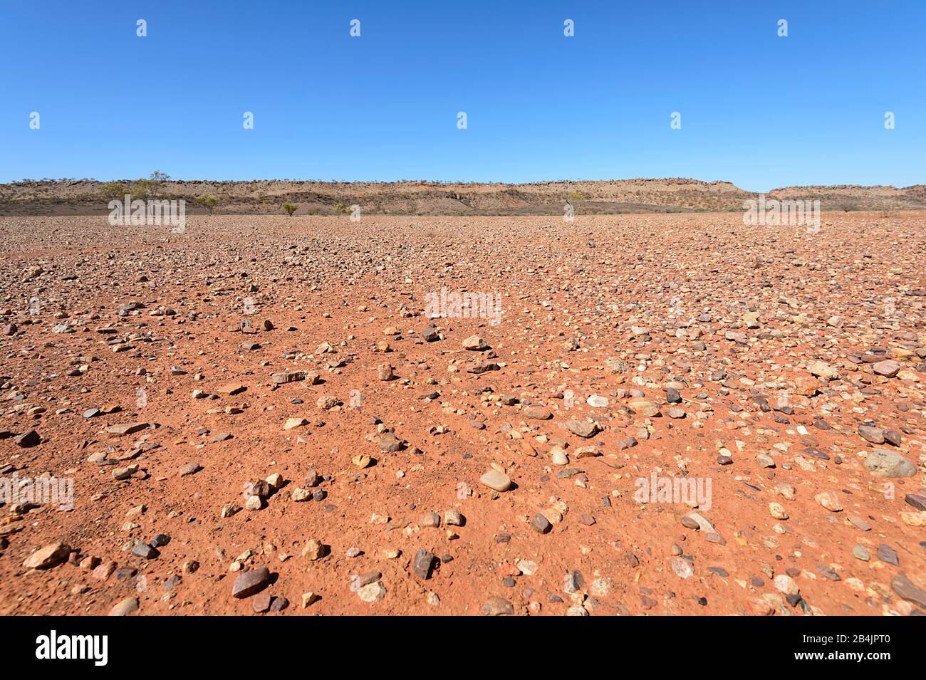 Parched stony land by Henbury craters, Stuart Highway, Northern Territory, NT, Australia Stock Photo