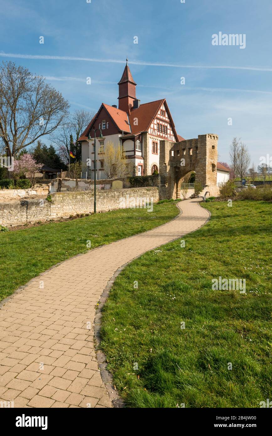 Uffhub gate with old E-Werk in Ingelheim am Rhein, part of the southwestern city fortifications from the 14th century, shell tower with archway and battlements, Stock Photo