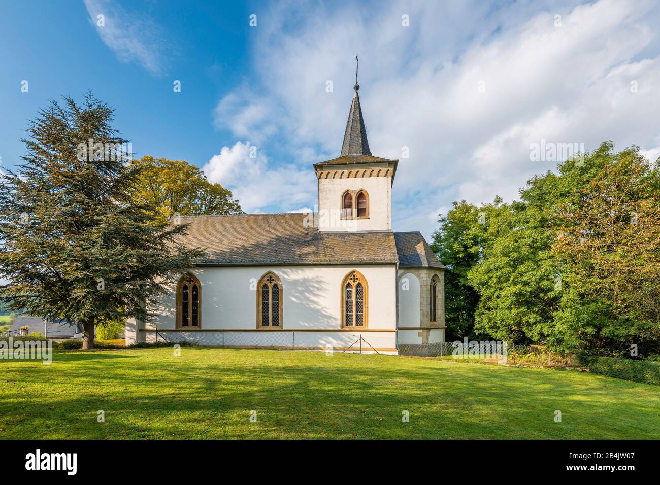 Church in Niederhosenbach, stands on the foundations of a property that is considered the birthplace of Hildegard von Bingen, the father was Hildebrecht Hosinbach, located in Hosenbachtal (Hunsrück), Stock Photo