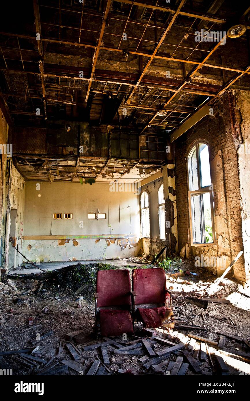 Two cinema seats in abandoned sanatorium Stock Photo