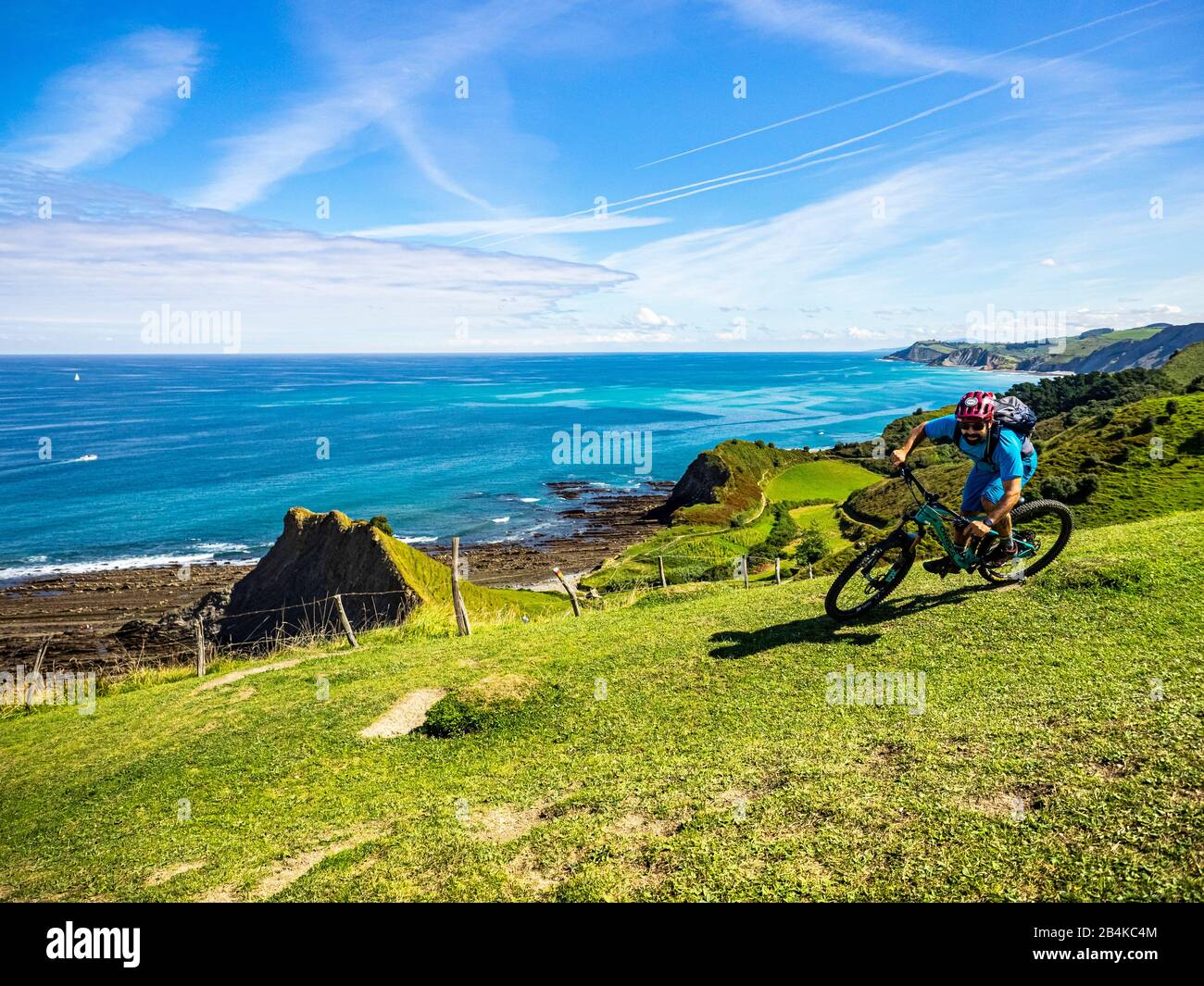 Mountain biking in the Basque Country, cliffs near Zumaia and the Basque Coast Geopark Stock Photo