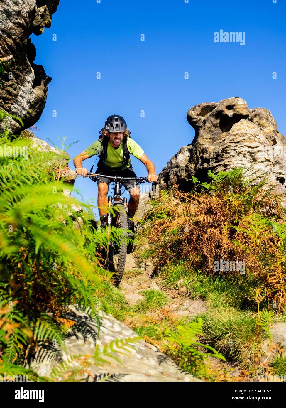 Mountain biking in the Basque Country, cliffs and mountains at Hondarribia on the Bay of Biscay Stock Photo