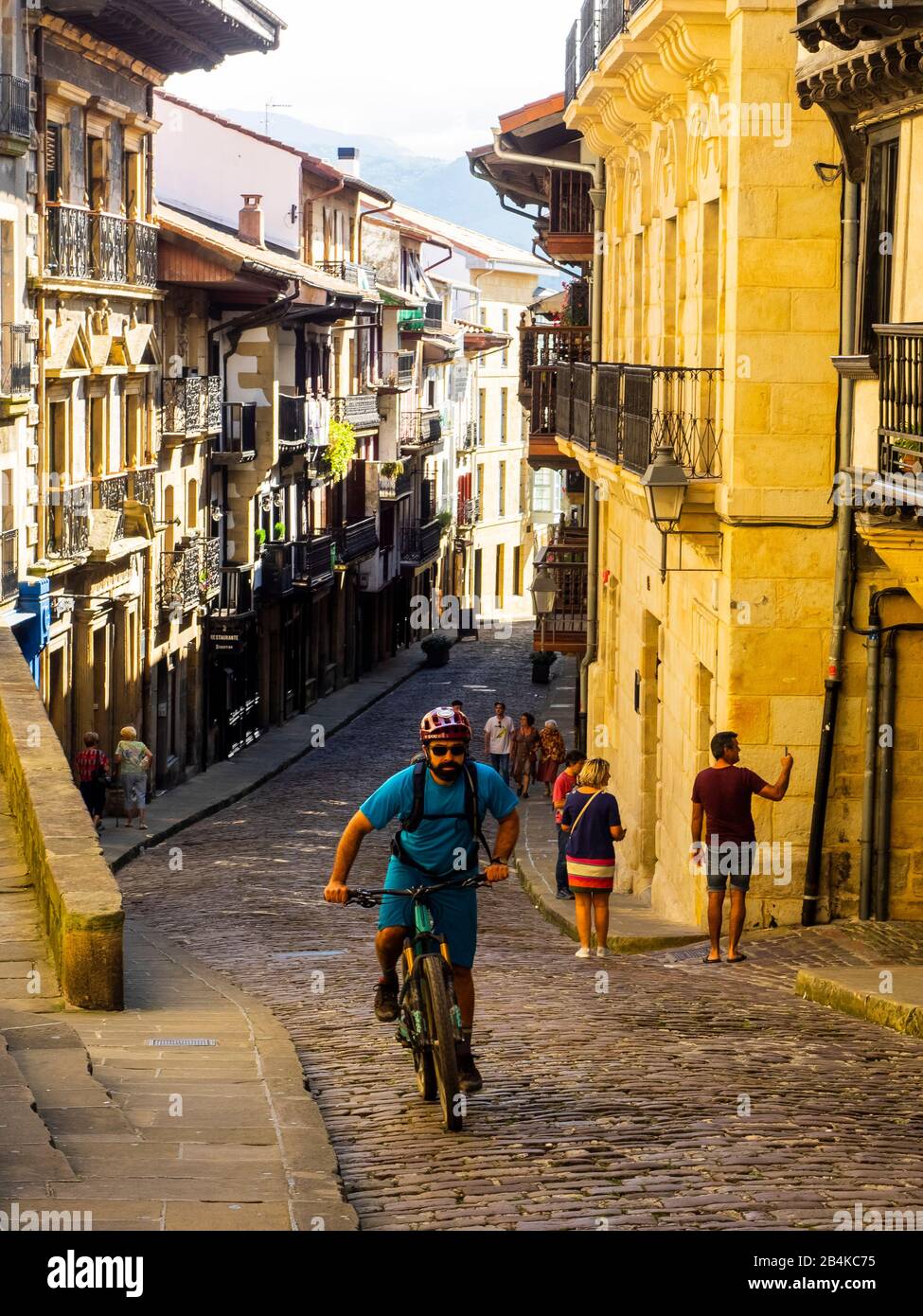 Mountain biking in the Basque Country, old town and alleys of Hondarribia Stock Photo