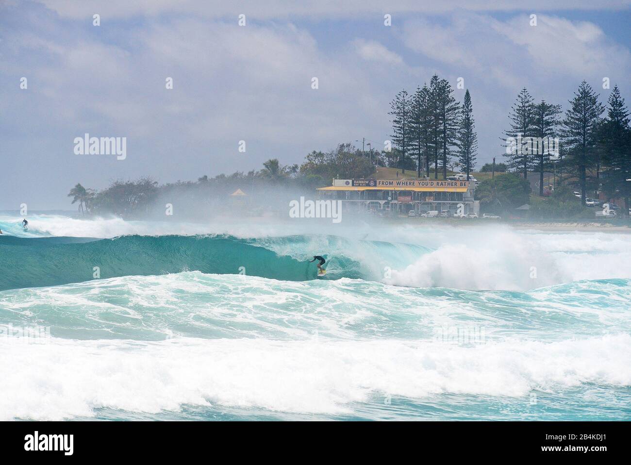 A surfer getting barreled in Greenmount, Gold Coast, Australia Stock Photo