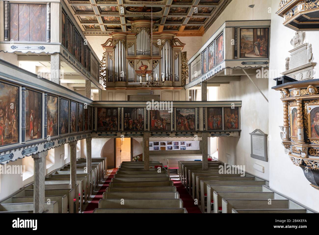 Germany, Saxony-Anhalt, Brumby, view of the organ of the Protestant village church Sankt Petri, near the highway 14. It bears the nickname Autobahnkirche Brumby. On the ceiling of the church, single-leaf woodcuts depict scenes from the Bible. Stock Photo