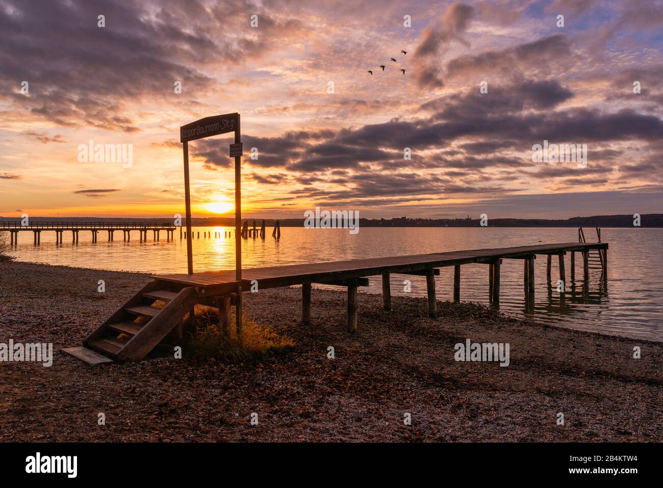Inning community, Buch am Ammersee, beach, sunset with gate Stock Photo
