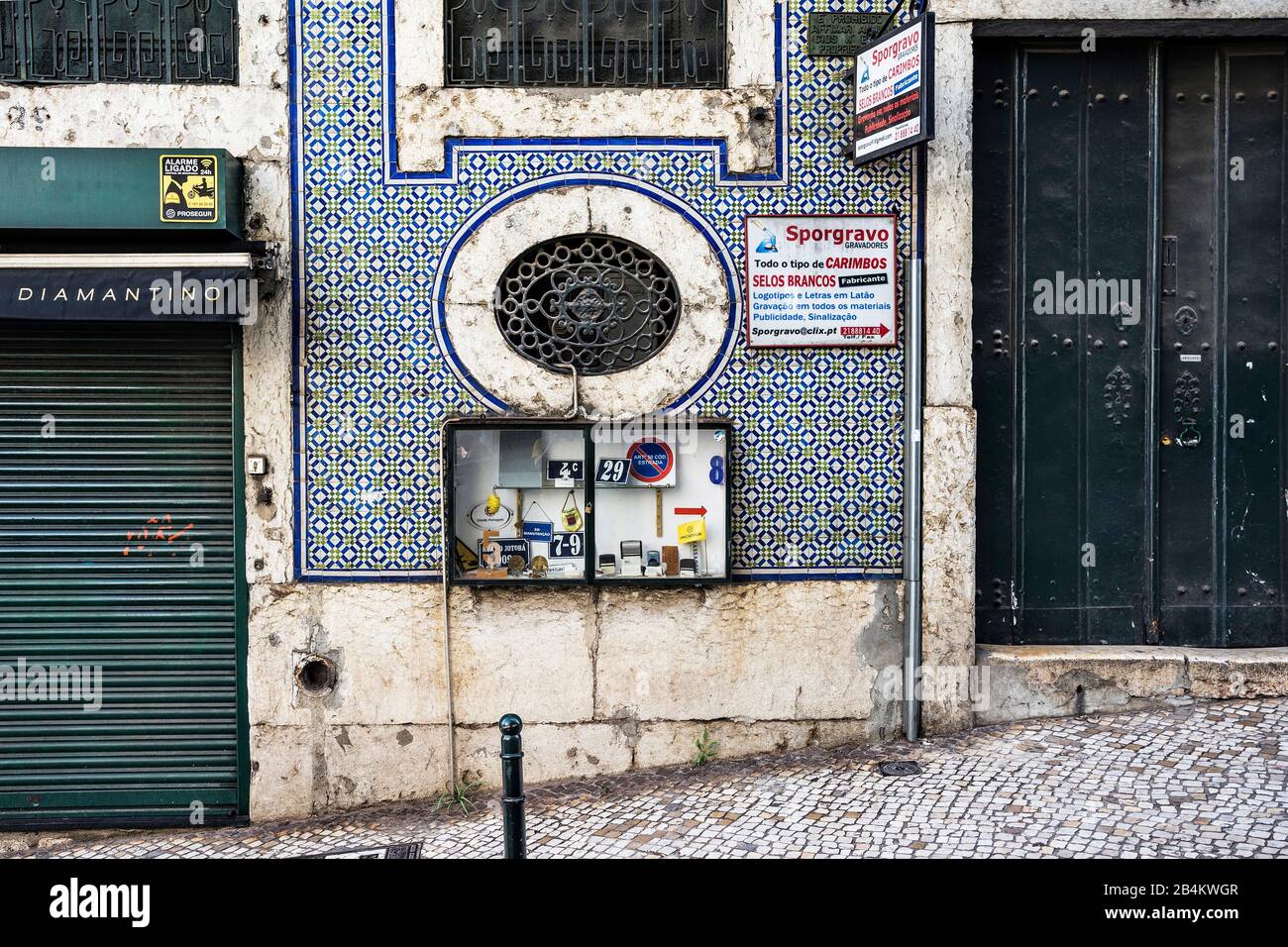 Europe Portugal Capital City Old Town Of Lisbon Baixa Rua Da Madalena Old House Facade With Azulejos Sign Factory Stock Photo Alamy
