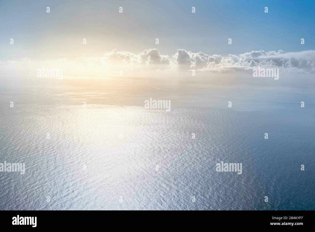 wide sea bird eye view with blue sky at sunrise Stock Photo