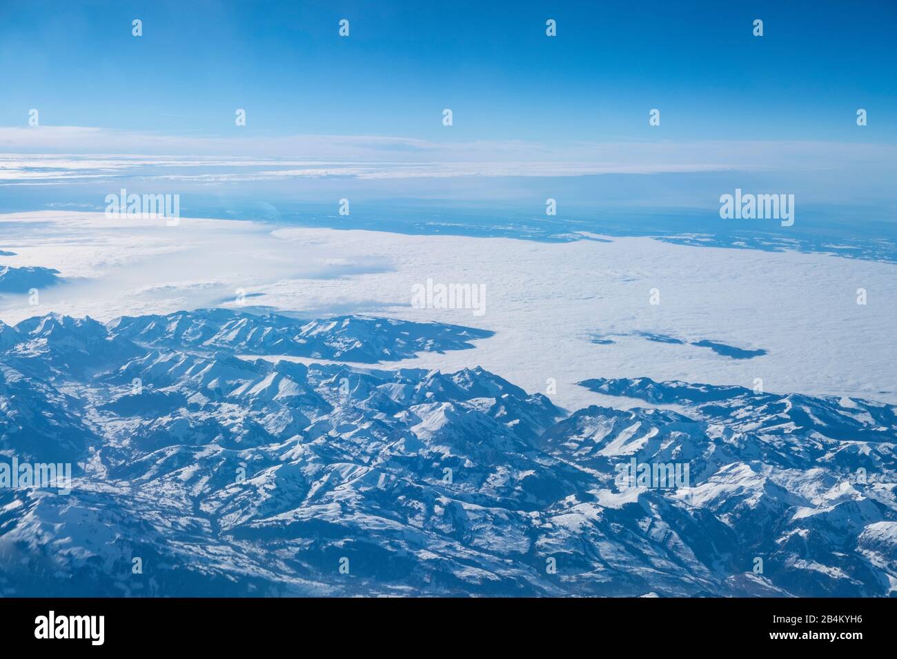 Massif from above with cloud cover in the background, Pyrenees, bird's eye view Stock Photo