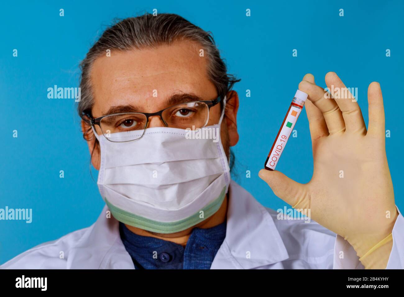 Medical working with blood sample a COVID19 coronavirus laboratory