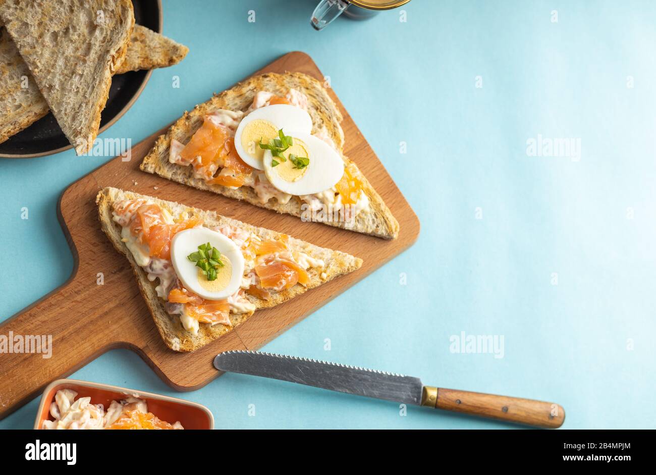Smoked salmon on toasted bread with cream cheese hires stock