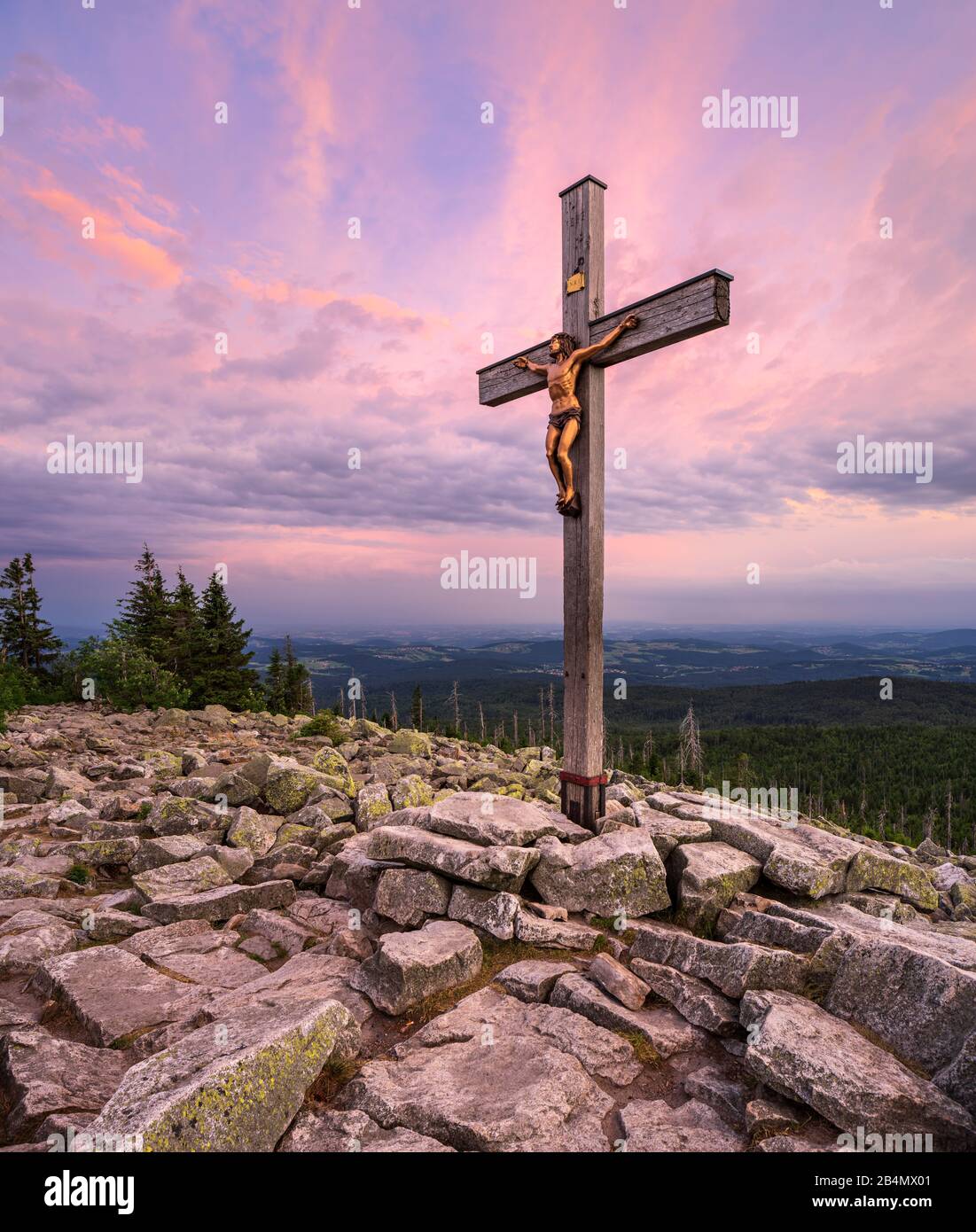 Germany, Bavaria, Bavarian Forest National Park, view from the summit of Lusen at sunset, summit cross Stock Photo