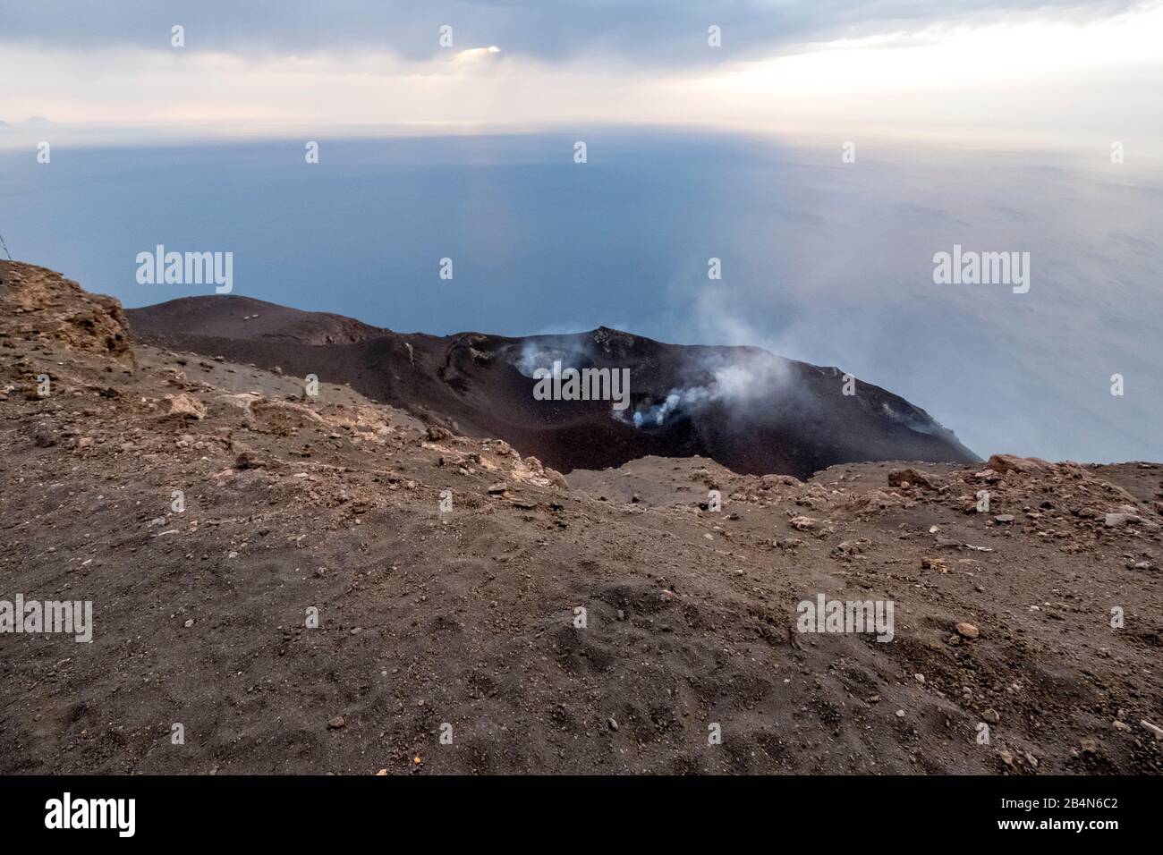 Crater with cloud of smoke from Stromboli Lipari volcano, Aeolian Islands, Aeolian Islands, Tyrrhenian Sea, Southern Italy, Europe, Sicily, Italy Stock Photo