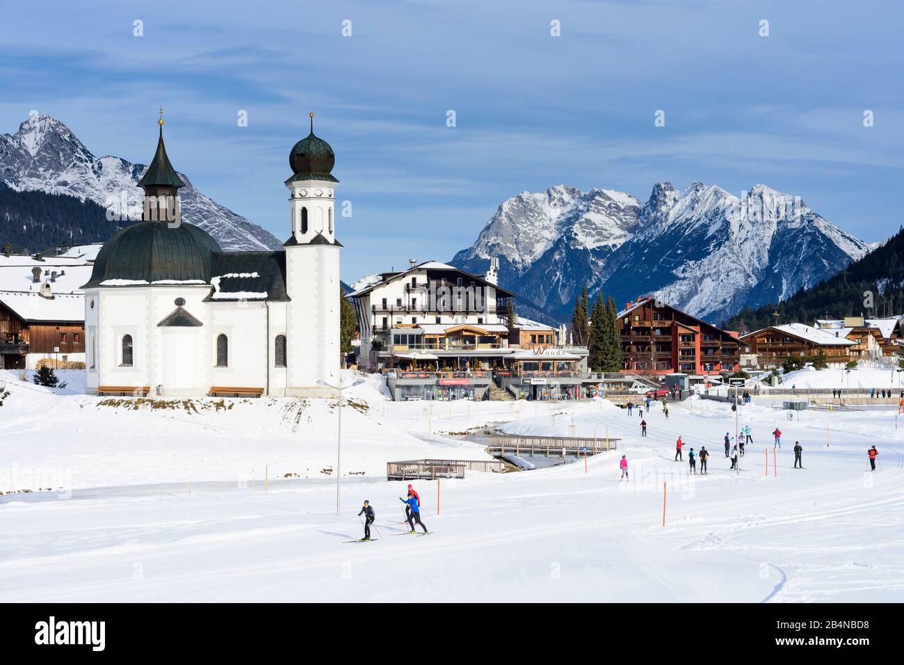Seefeld in Tirol, church Seekirche, cross-country skiing piste, mountain Karwendel in Olympiaregion Seefeld, Tyrol, Austria Stock Photo