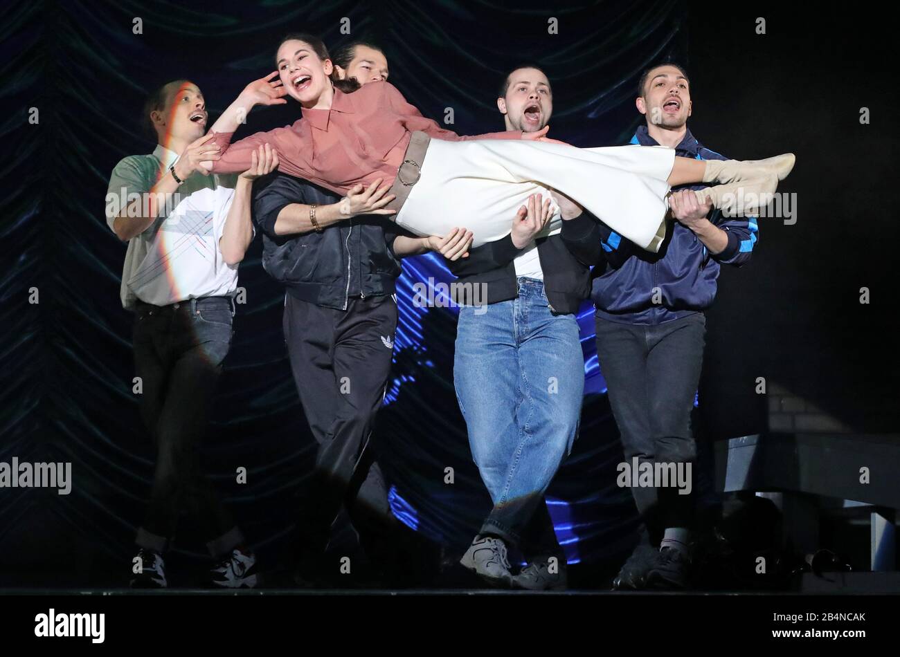 Rostock, Germany. 05th Mar, 2020. Amalia von Edelreich (Natalja Joselewitsch) with the robbers (dancers of the dance company Vincent Wodrich, Flurin Stocker, Anton Shults and Antonio Spatuzzi) in the piece 'The Robbers' by Friedrich Schiller, which premieres on 07.03.2020 at the Volkstheater. The classic of Sturm und Drang, which premiered in 1782, is being presented in cooperation with tanzland e.V. and young comrades-in-arms from Rostock and surroundings. Credit: Bernd Wüstneck/dpa-Zentralbild/dpa/Alamy Live News Stock Photo