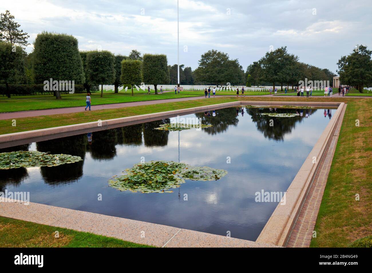 The American military cemetery Saint-Laurent on Omaha Beach in Normandy near Colleville-sur-Mer. The reflecting pond and the promenade. Stock Photo